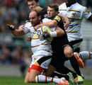 Wasps' Andy Goode is brought to ground by Richard Wigglesworth