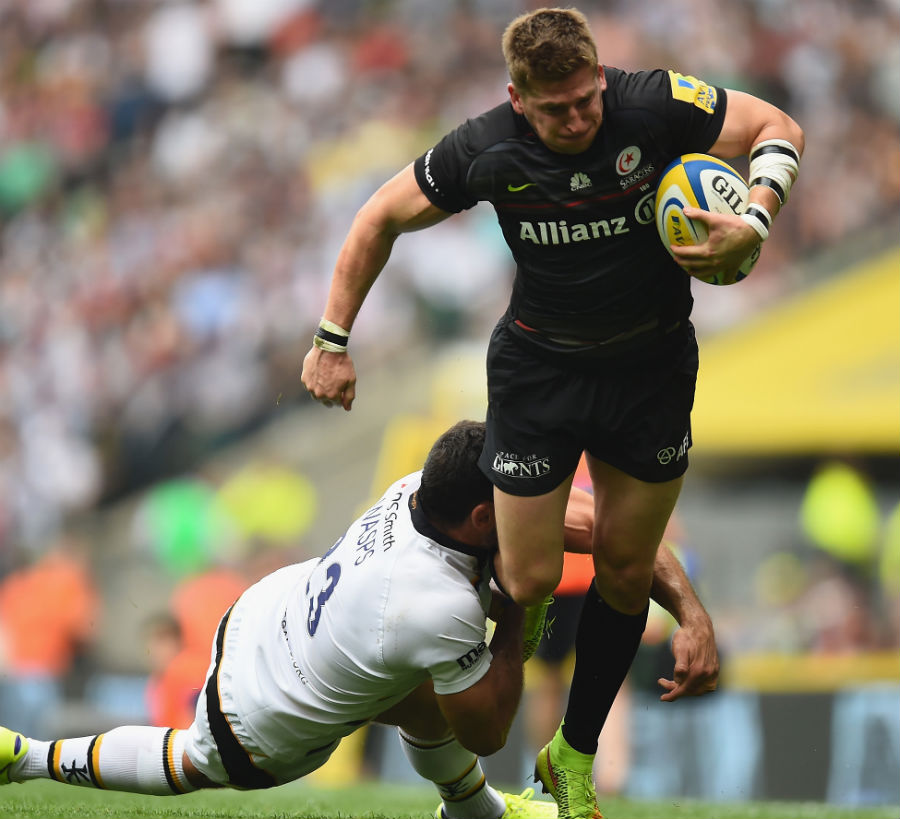 Saracens' David Strettle breaks through the Wasps tackle