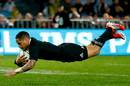 All Blacks scrum-half Aaron Smith dives over for a try