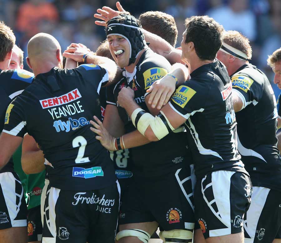Exeter celebrate one of their seven tries against London Welsh