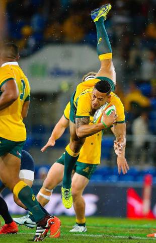Australia's Israel Folau lands after collecting a high ball, Australia v Argentina, Rugby Championship, Cbus Super Stadium, Gold Coast, September 13, 2014