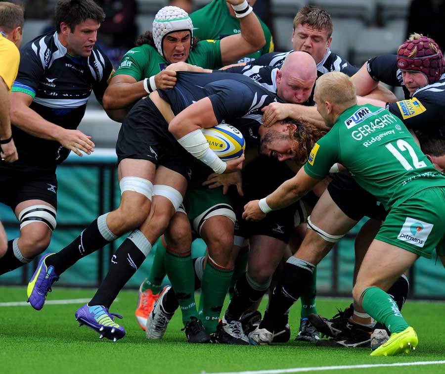 Newcastle Falcons' Josh Furno is carried towards the line