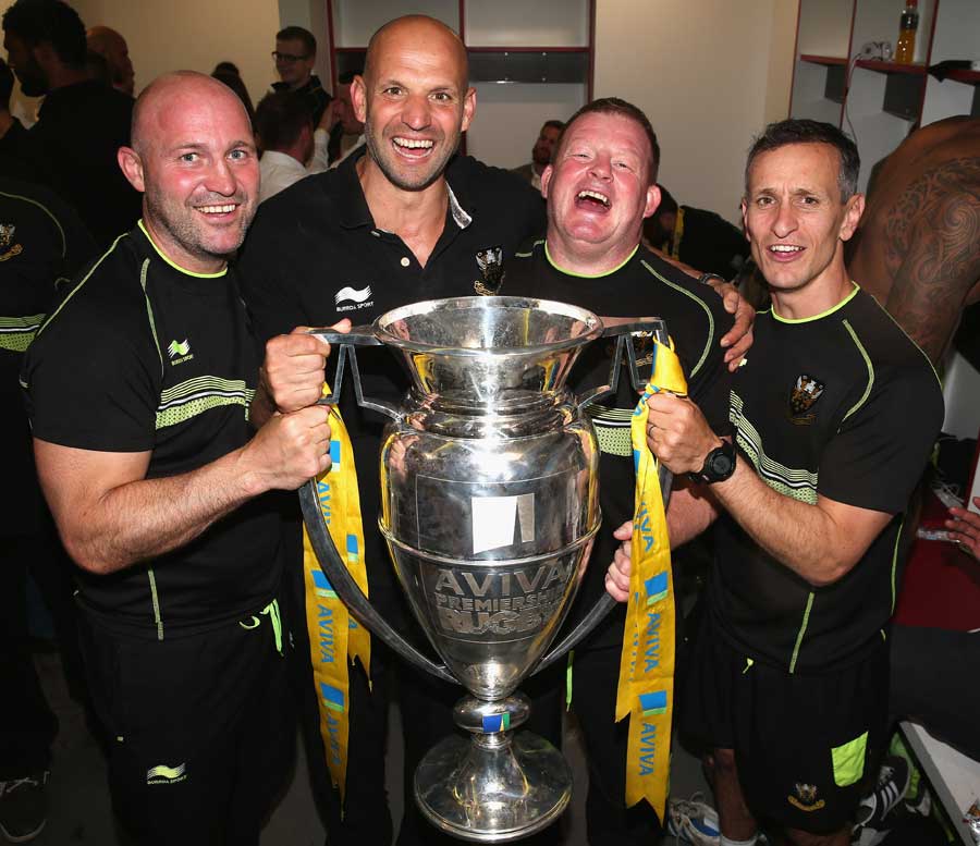 The Northampton Saints coaches celebrate their Aviva Premiership triumph