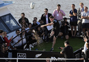 All Blacks fly-half Colin Slade kicks a ball over the Woman' Bridge during a kicking contest held on board the Galileo catamaran
