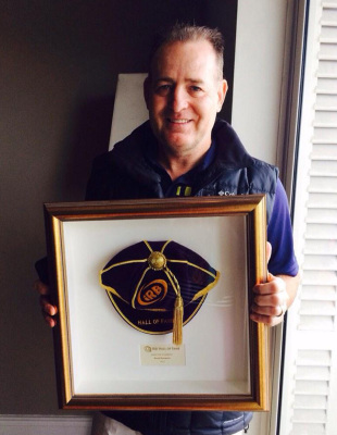 David Campese poses after his induction into the IRB Hall of Fame, September 26, 2014