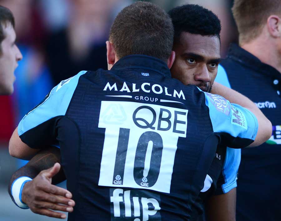 Glasgow's Duncan Weir embraces try-scorer Niko Matawalu