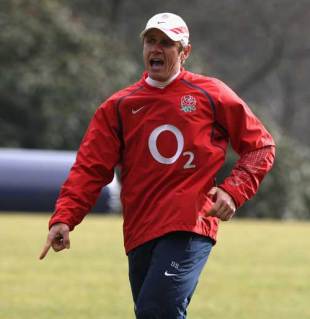 England backs coach Brian Smith offers some instruction during a training session, Pennyhill Park Hotel, Bagshot, England, February 19, 2009