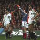 John Davies is shown the Five Nations' first red card by Didier Mené for kicking Ben Clarke