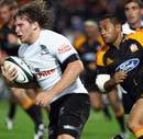 Sharks centre Francois Steyn breaks clear of the Chiefs' defence