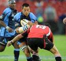 Pierre Spies is tackled by Jaques Fourie