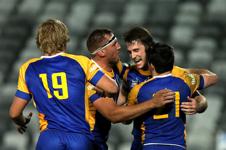Brisbane City team mates celebrate the win after the NRC Semi Final match