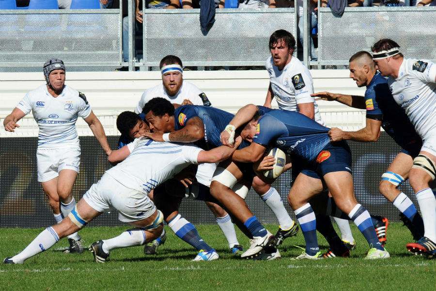 Castres and Leinster players battle for the ball