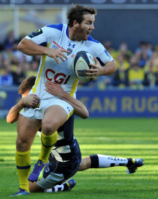 Camille Lopez is tackled by a Sale defender, Clermont Auvergne v Sale Sharks, European Rugby Champions Cup, Michelin stadium, Clermont-Ferrand, October 26, 2014