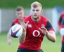 George Kruis takes a ball during England training