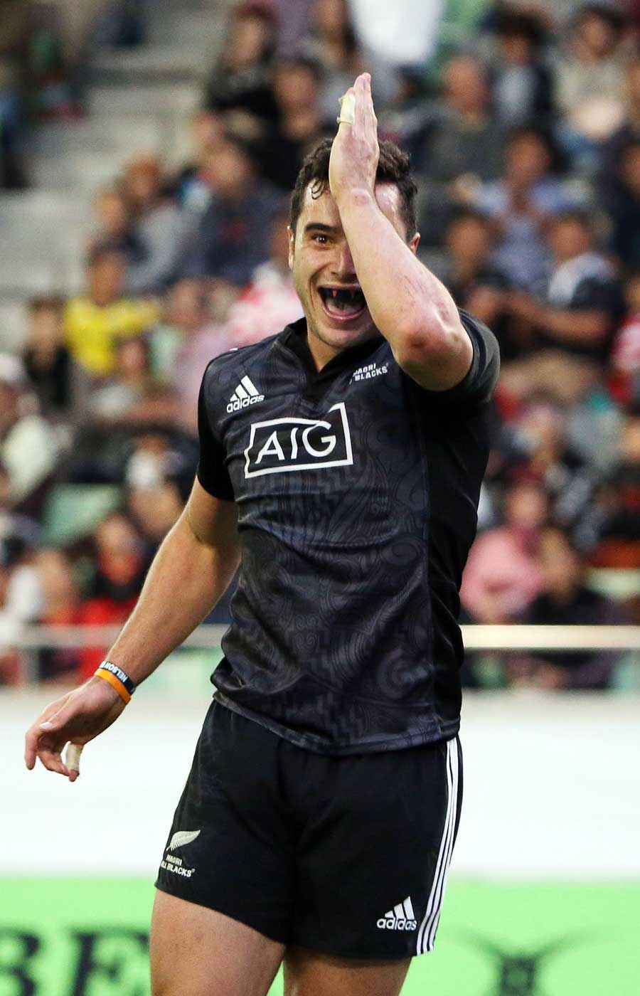 New Zealand Maori All Blacks' James :Lowe celebrates a try