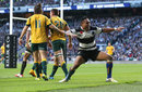 Francis Saili of the Barbarians celebrates after scoring a try