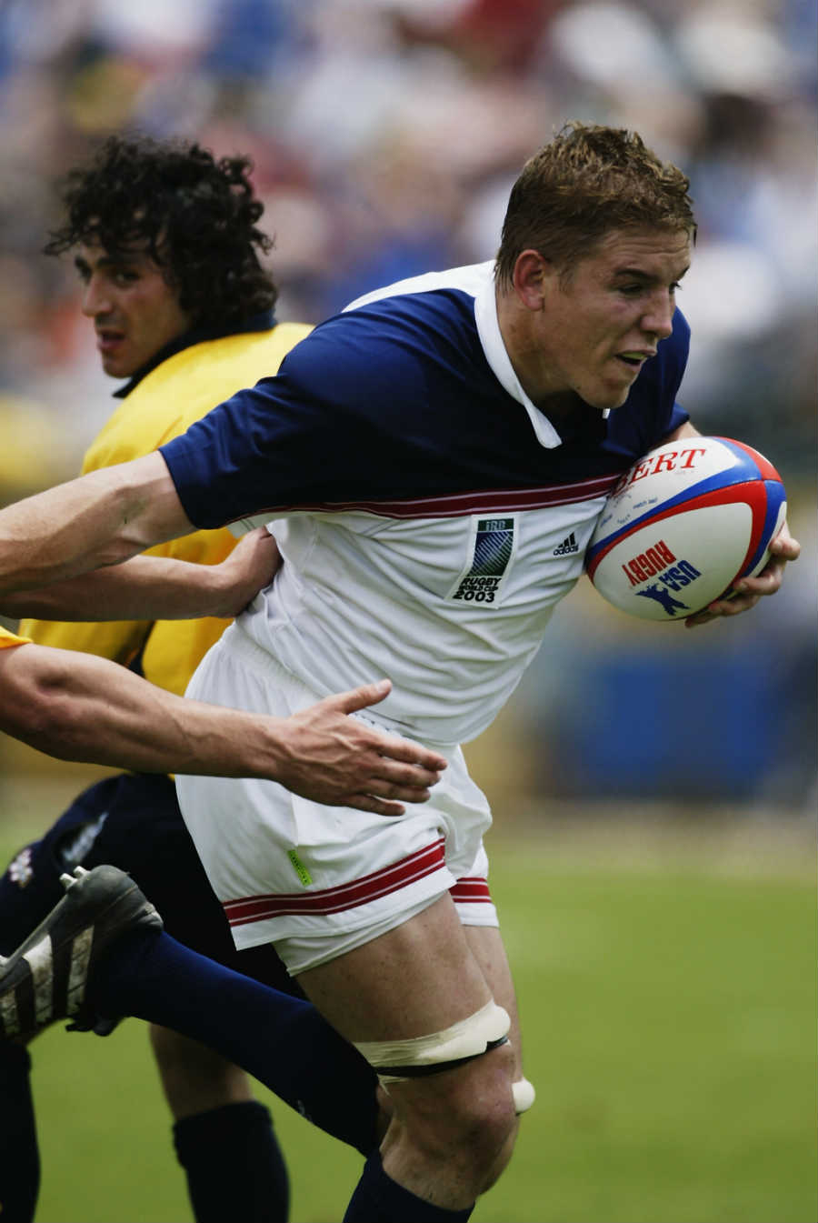 Dan Lyle makes some yards for the USA