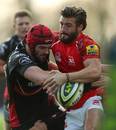 London Welsh's Seb Stegmann is tackled by Gloucester's Tom Hicks