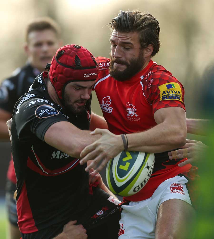 London Welsh's Seb Stegmann is tackled by Gloucester's Tom Hicks