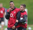 England's Anthony Watson and George Ford share a joke in training