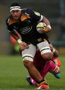 Wasps' Nathan Hughes powers through the London Welsh defence