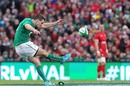 Ireland's fly-half Johnny Sexton kicks a penalty
