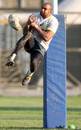 South Africa's Cornal Hendricks leaps high during training