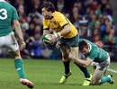 Australia's Adam Ashley-Cooper tries to escape the clutches of Ireland's Tommy Bowe