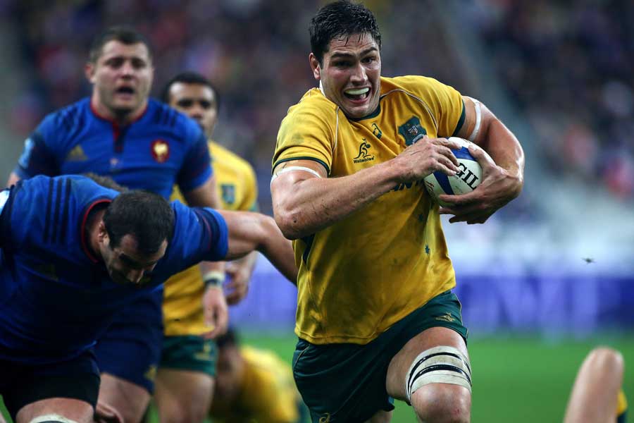 Australia's Rob Simmons breaks away to score a try