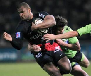Toulouse centre Malell Kunavore is tackled by Montauban fly-half Regis Lespinas, Toulouse v Montauban, Top 14, Ernest Wallon Stadium, Toulouse, France, February 28, 2009
