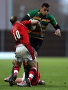 Northampton centre Luther Burrell charges over Gordon Ross of London Welsh