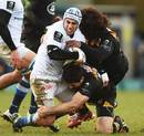 Castres' Daniel Kirkpatrick is wrapped up by Ashley Johnson and Andrea Masi