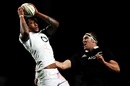 Courtney Lawes and Brodie Retallick compete for the ball at the lineout
