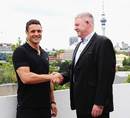Dan Carter shakes NZRU CEO Steve Tew's hand on the day his move to Racing Metro was confirmed