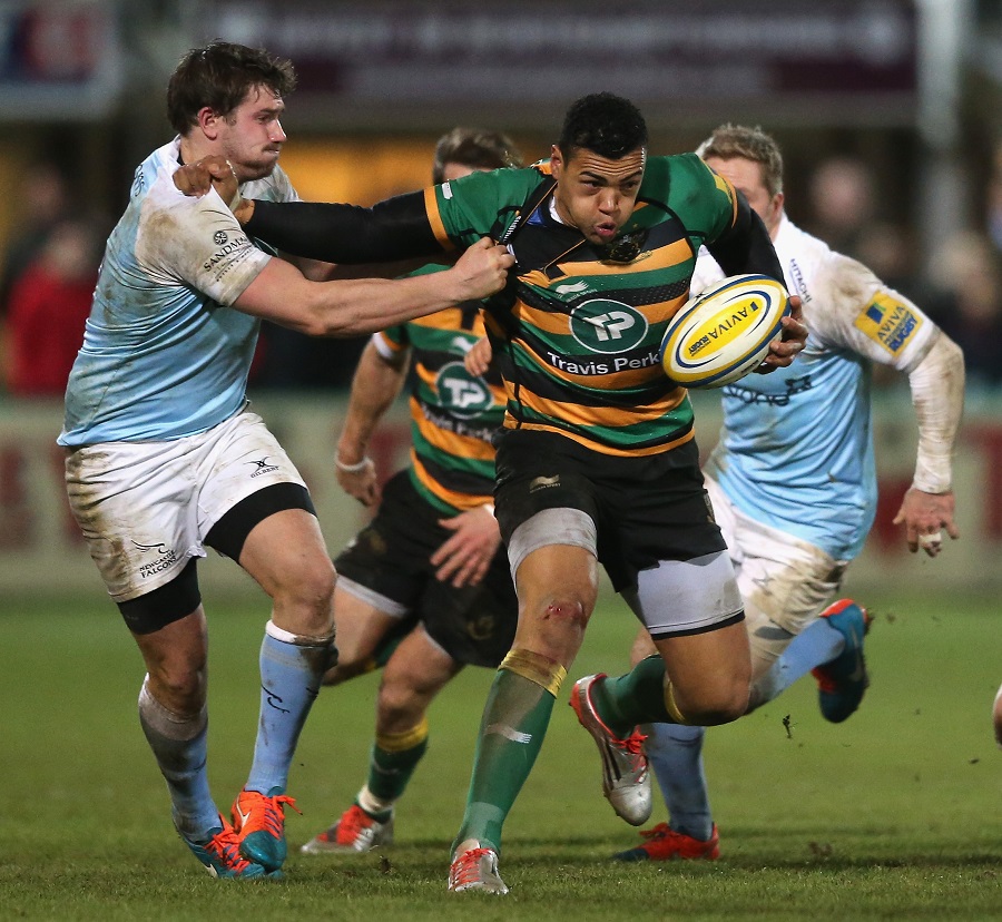 Luther Burrell holds off Adam Powell