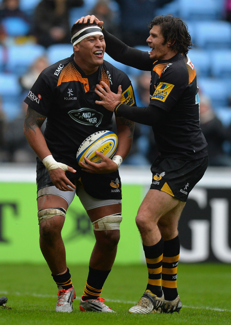 Wasps' Nathan Hughes is congratulated on his try