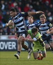 Sale's Johnny Leota attempts to escape the clutches of Northampton's Lee Dickson