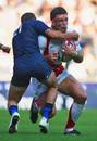 England's Joe Worsley is tackled by France's Frederic Michalak