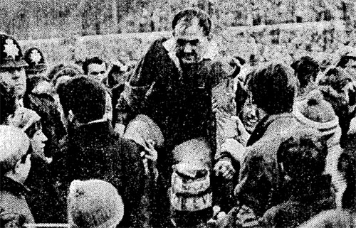 Clive Rowlands is chaired off the field after Wales' Triple Crown success in 1968