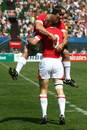 Wales' Tom Issacs is congratulated on a try against New Zealand