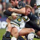 Northampton's Roger Wilson is tackled by Worcester's Pat Sanderson