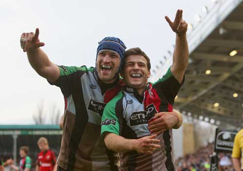 Harlequins' Danny Care celebrates scoring a try with team mate George Robson