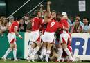 Wales celebrate winning the 2009 Rugby World Cup Sevens crown