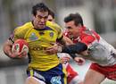 Biarritz's Nicolas Brusque tackles Clermont's Gonzalo Canale
