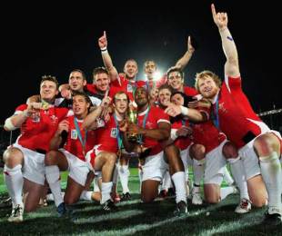 Wales celebrate on the pitch with the Melrose Cup after winning the Rugby World Cup Sevens Final against Argentina, The Sevens Stadium, Dubai, UAE, March 7, 2009
