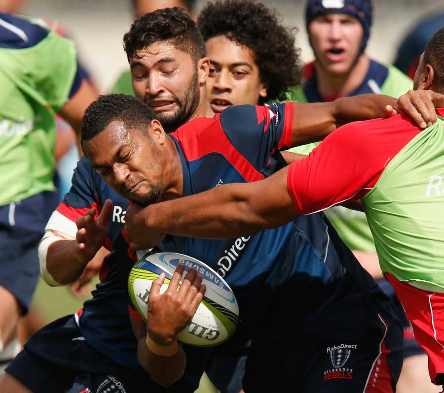 Melbourne Rebels' Sefanaia Naivalu is halted in his tracks