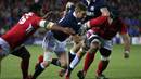 Scotland's Finn Russell makes a break against Tonga