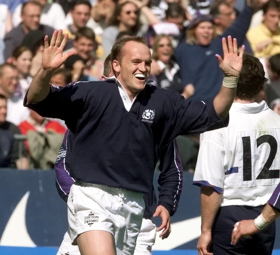 Gregor Townsend celebrates scoring a try