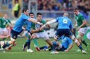 Ireland's Conor Murray takes on the Italy defence