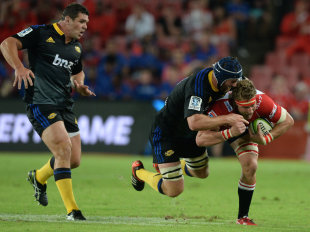 Lions' Robert Kruger takes on Mark Abbott, Lions v Hurricanes, Super Rugby, Emirates Airline Park, Pretoria, February 13, 2015